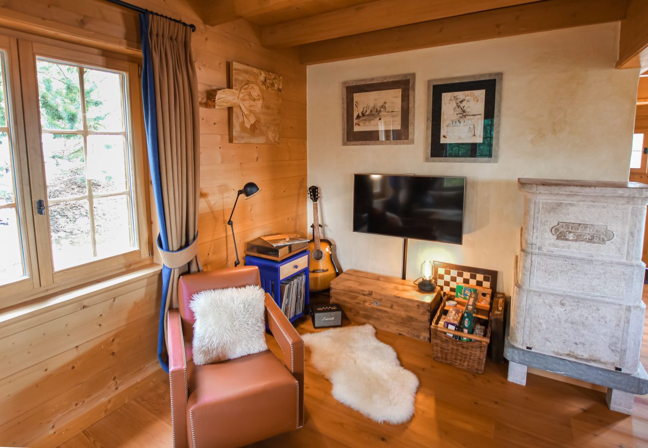 Chalet Ibex - TV corner - Verbier Location™ TV corner with Pierre Ollaire