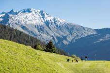 Golf Course des Esserts in Verbier with a view of the Combin massif